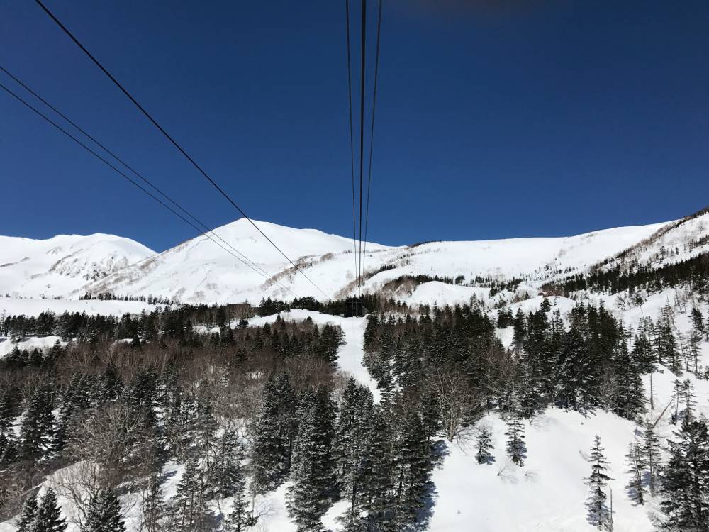 Looking up to Norikura peak and the Tsugaike Backcountry