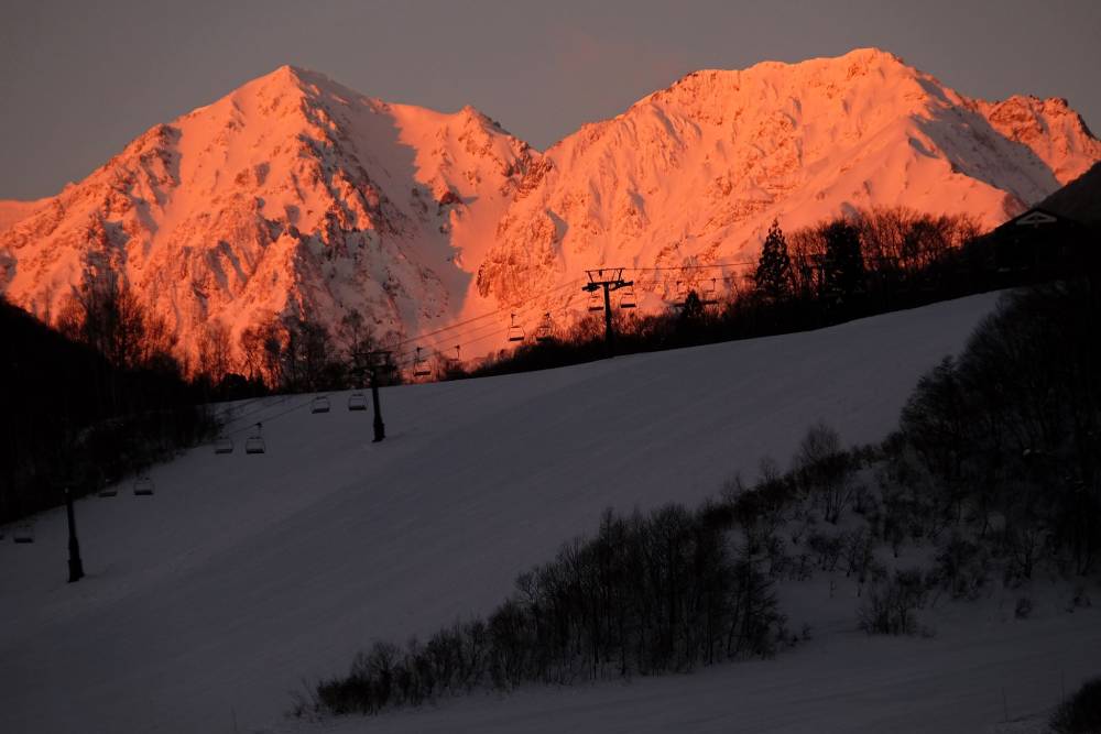 Early Morning Glow under Japan's Rising Sun at Tsugaike Resort