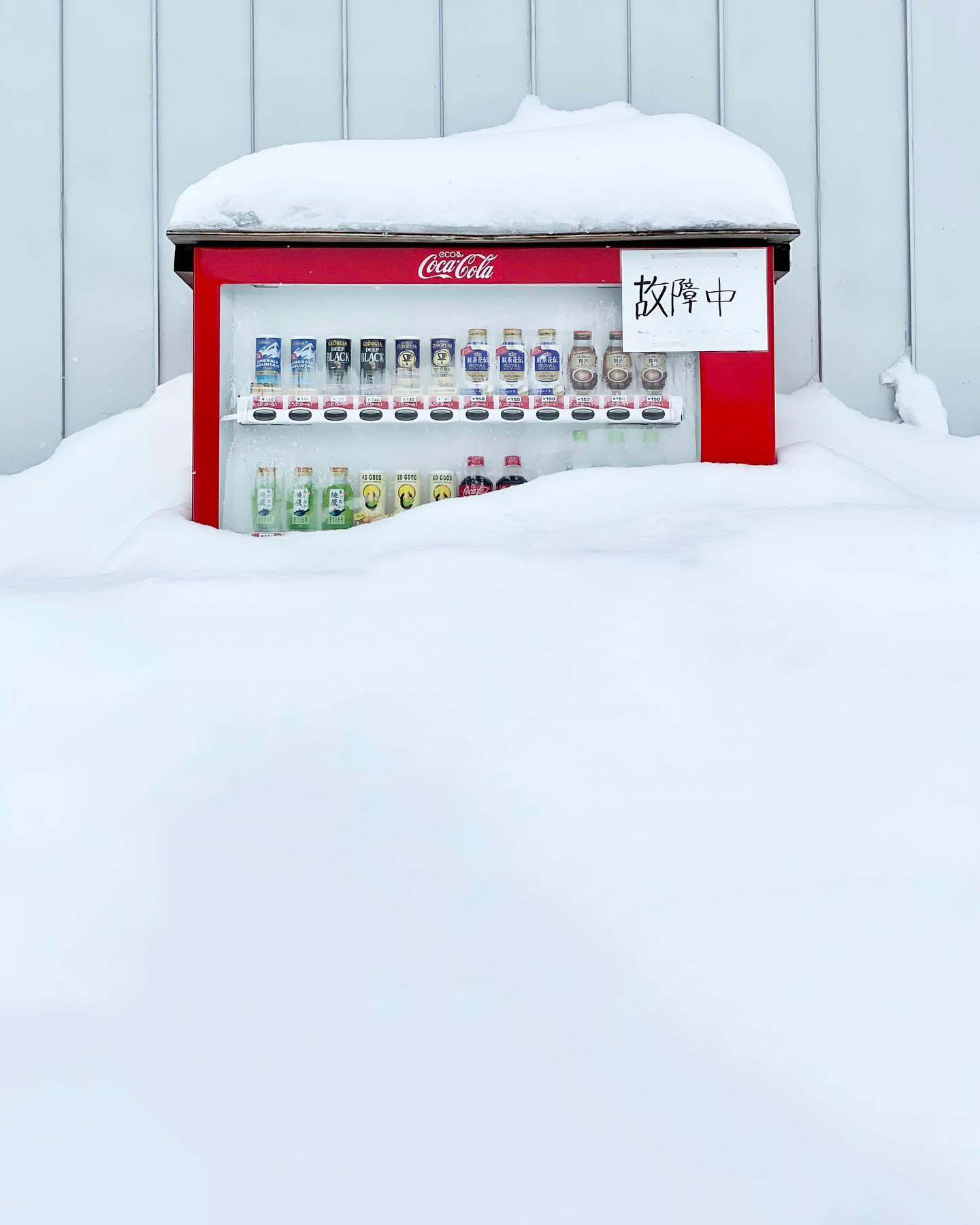 Vending machine buried in snow in niseko